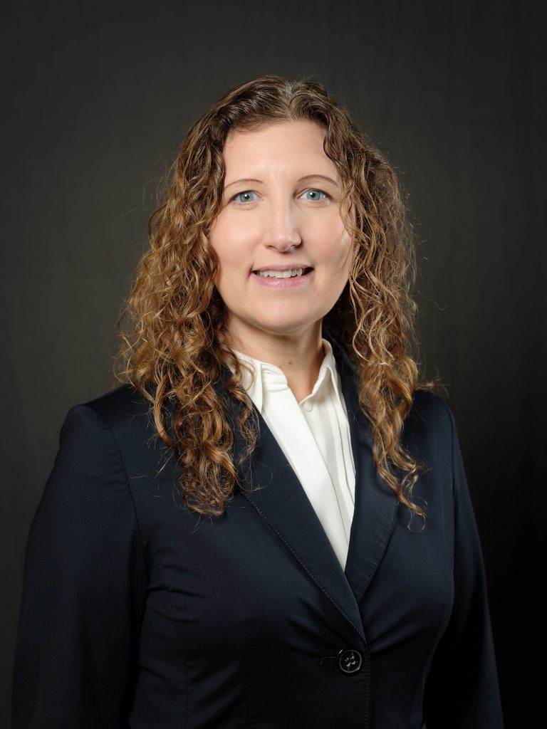 Portrait of Bridget Parrish in black sport coat